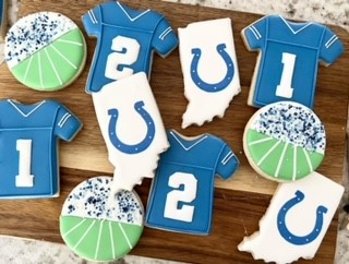Cookies in the shape of Colts jerseys and Indiana.
