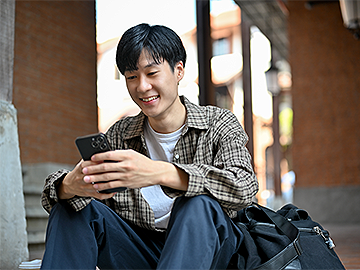 college-student-using-mobile-phone