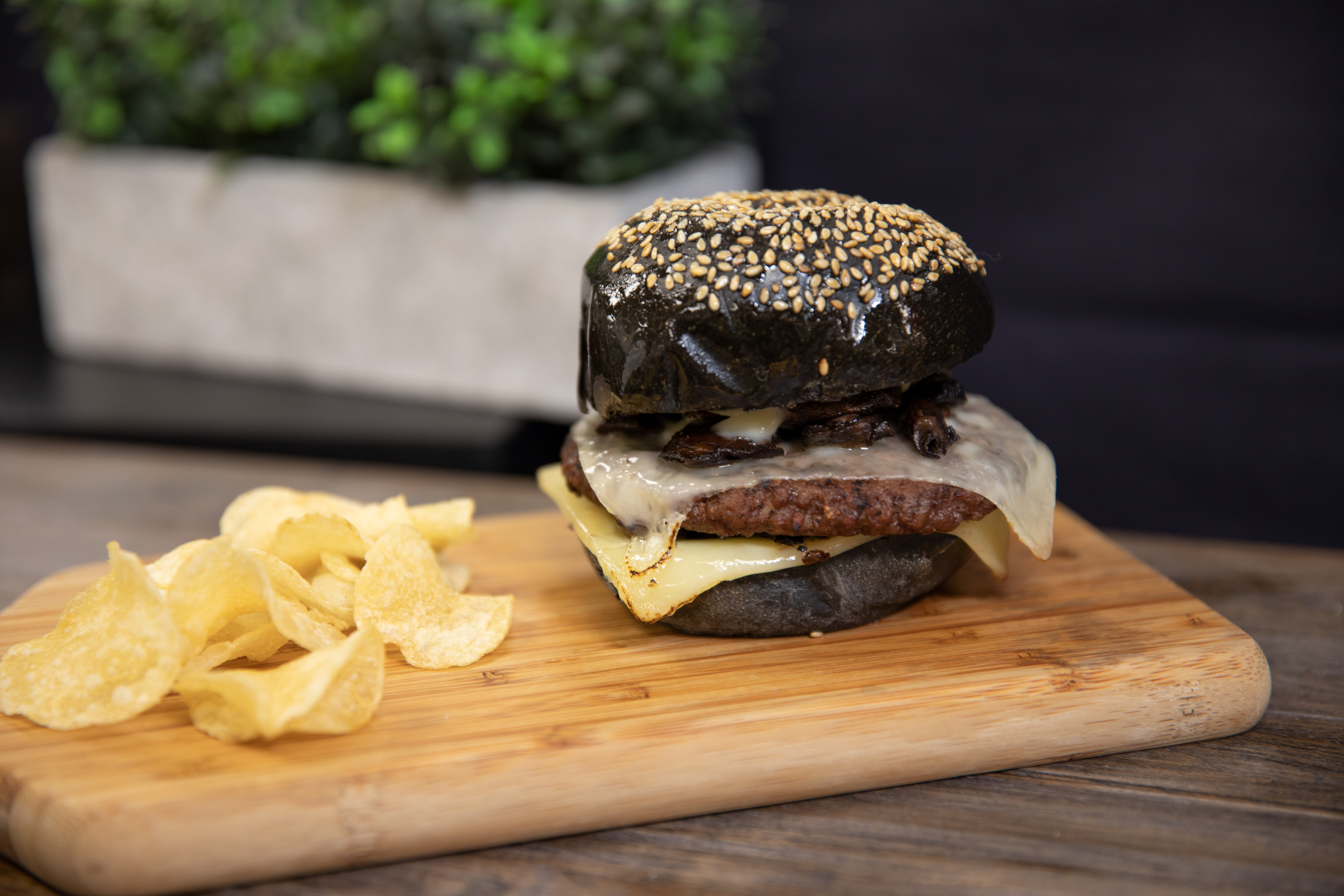 Image of burger on black bun